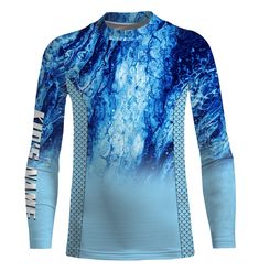 a blue and white shirt with an abstract design on the front, it is long sleeved