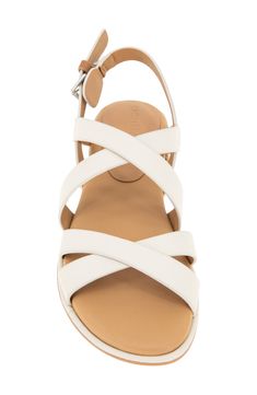 Slender straps crisscross over the vamp of a leather slingback sandal grounded by a cushioned footbed for lasting wear. Adjustable slingback strap with buckle closure Removable, PORON®-cushioned insole with arch support Leather upper and lining/rubber sole Imported Modern Strappy Leather Slingback Sandals, Leather Cross Strap Slingback Sandals For Spring, White Leather Cross Strap Sandals, Spring Leather Sandals With Crisscross Straps, Leather Strappy Slingback Sandals, Leather Strappy Slingback Sandals With Heel Strap, Modern Cross Strap Sandals With Removable Insole, Leather Sandals With Crisscross Straps For Summer, White Strappy Slingback Sandals With Removable Insole