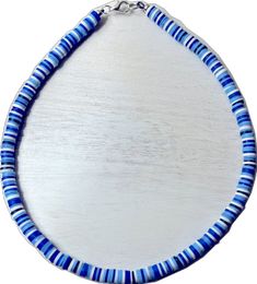 Blue Strand Beaded Necklaces For Vacation, Blue Strand Beaded Necklace For Vacation, Hand-strung Blue Beads For Beach, Blue Heishi Beads Jewelry For Vacation, Vacation Blue Heishi Beads Jewelry, Blue Single Strand Necklace For Beach, Blue Heishi Beads Necklace, Blue Heishi Bead Necklaces, Blue Heishi Beads Necklace With Round Beads