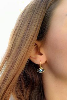 hoop earringsgold hoop earringsdangle earringshuggie hoop earringsclip on earringsgold evil eyeevil eye earringsgold earringsdrop earringsgift for hervintage earringssmall hoop earringselegant earrings evil eye jewelryEvil eye hoop earringsThis cute earrings are made from steell and they are 24k gold plated.You can choose between 4 different clasps (the numbers 1 and 2 are for non pierced ears) and between 2 styles (transparent, black).They are very light and comfortable!Plus they are anti aller Trendy Gold Plated Nickel-free Jewelry, Trendy Hypoallergenic Gold Plated Jewelry, Trendy Nickel-free Gold-plated Jewelry, Trendy 14k Gold Filled Earrings, Hypoallergenic Gold Plated Jewelry, Adjustable Gold Evil Eye Earrings, Gold Evil Eye Drop Earrings, Hypoallergenic Gold Plated Small Hoop Jewelry, Trendy Gold Plated Earrings For Gifts