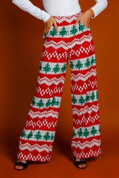 Women's Knit Print Christmas Pants | The Red Ryder Festive Fall Wide Leg Pants, Festive Wide Leg Pants For Fall, Festive Wide Leg Pants For Holidays, Red Wide-leg Bottoms For Winter, Red Wide Leg Winter Pants, Casual Christmas Holiday Bottoms, Casual Christmas Holiday Pants, Casual Holiday Pants For Christmas, Casual Pants For Winter Holiday