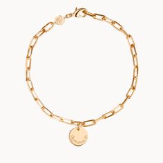 Our Dainty Love Links Bracelet is the perfect personalized bracelet for any occasion piece. Hand-engrave up to 14 characters and cherish the special memories forever.18K Champagne Gold Plated or 925 Sterling SilverChain length &amp; style: 7 Trace ChainCharm: 0.4 Diameter, 0.03 ThicknessCharms are not removable from this chainHand-engraved in our Paris workshopSent with love in a complimentary gift boxAny slight variations in lettering depth, spacing and alignment from the examples shown are Personalized Yellow Gold Friendship Bracelets, Elegant Name Bracelet With Charms For Friendship, Classic Gold Name Bracelet For Friendship, Elegant Chain Bracelet With Charms For Friendship, Elegant Engraved Chain Bracelet For Friendship, Gold Engraved Charm Bracelet For Everyday, Gold Bracelets With Engraving Option For Friendship, Everyday Gold Engraved Charm Bracelet, Everyday Engraved Gold Charm Bracelet