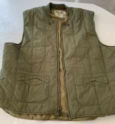 American Living Men's Army green sleeveless vest. Size XXL. Rarely worn, good condition. Army green, military styling. Casual Khaki Cotton Vest, Casual Cotton Vest For Cold Weather, Casual Olive Cotton Outerwear, Casual Solid Vest For Cold Weather, Comfortable Cotton Outerwear, Comfortable Cotton Outerwear For Spring, Comfortable Cotton Spring Outerwear, American Living, Sleeveless Vest