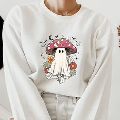 Retro Halloween Sweatshirt, Funny Halloween Ghost Sweatshirt, Halloween Hiking Sweatshirt, Spooky Season Sweatshirt Hello there!  Welcome to SoftQualityShirtstore.  Here, you will discover a wide selection of affordable, high-quality personalized designs and unique creations that are comfortable, stylish, and perfect for your family, friends, and loved ones. Our prints are created using the latest technological materials, and each order is meticulously prepared from the production process to the Ghost Mushroom, Hiking Sweatshirt, Garment Sewing, Ghost Sweatshirt, Sweatshirt Halloween, Sweatshirt Cute, Custom Sweatshirts, Happy Fun, Halloween Sweatshirt