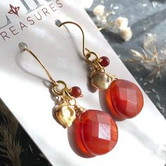 "6688 Carnelian Pearl Earrings Gold finish orange natural stone boho statement cluster dangle drops  birthday anniversary Valentine's day Mother's day Christmas stuffing stockings holiday gift for her women mom sister wife girlfriend daughter niece aunt grandma cousin colleague best friend. Enjoy the beauty & power of natural gemstones. MATERIALS & DIMENSIONS ✦ Natural CARNELIAN, orange red, faceted pears 16x16mm, round beads 4mm; ✦ Freshwater PEARLS, gold dyed, cornflake approx. 8x6mm; ✦ GOLD p Orange Gemstone Dangle Earrings, Amber Dangle Earrings With Natural Stones, Orange Teardrop Gemstone Earrings, Nickel-free Carnelian Jewelry, Carnelian Drop Earrings Jewelry Gift, Orange Gemstone Dangle Jewelry, Carnelian Dangle Jewelry With Matching Earrings, Gold Bohemian Carnelian Earrings, Carnelian Gemstone Dangle Jewelry