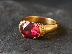 Gold Ruby Ring set with a Created Ruby in a perfect diamond cut, flawless clarity & deep red color, at 10x8mm, 3 Carats. Antique Ring design made of Gold Vermeil ☞ thickest 18k Gold Plating on top of Solid 925 Sterling Silver ☞ made to last. Matching Earrings & Matching Pendant - please ask me ☞ Choose your size ☞ I resize (before shipping) for FREE to Any size* ⌛Last Ring left ⌛ Details : ♥ Each item comes in a cute GIFT BOX ✓ ♥ GUARANTEE on the materials ✓ ♥ Created Ruby - perfect diamond cut Ruby Ring Designs, Man Gold Bracelet Design, Ruby Ring Set, Gold Ruby Ring, Red Gemstone Ring, Earrings Matching, Ruby Ring Gold, Red Stone Ring, Emerald Ring Gold