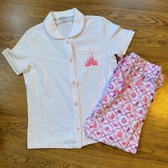 Disney Parks Pajama Set With Cinderella’s Castle On The Shirt And Logos For Many Of The Disney Princesses On The Pants. Disney Pjs For Teens, Disney Family Pajamas, Disney Pjs Primark, Disney Pjs Fluffy, Disney Sleepwear For Women, Disney Pajamas For Women, Orlando Outfits, Princess Pajamas, Disney Pjs