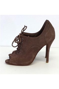 Size 6B Deep Taupe Peep Toe Heels Leather sole Some wear on outsole Leather upper Lace up front Lightly padded insole Heel height 4.25" Lace-up Heels With 4-inch Heel Medium Width, Lace-up Heels With 4-inch Heel And Medium Width, Brown Ankle-high Heels With Padded Heel, Closed Toe Heels With Padded Ankle And Medium Width, Brown Leather Heels With Padded Ankle, Medium Width Closed Toe Heels With Padded Ankle, Suede Lace-up Heels With 4-inch Heel, Lace-up Suede Heels With 4-inch Heel, 4-inch Lace-up Suede Heels