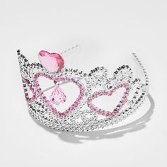 Reign with love with this Claire's Club heart crown! You'll look like royalty wearing the silver-tone crown with a centered pink heart gem, and an assorment of faux gems for an added touch. Add this piece to your dress-up bin for a regal look. Crown by Claire's Club Faux gemstones Material: Plastic Suitable for ages 3-6 - Claire's Club Pink Heart Crown Pink Pinched Crown For Party, Adjustable Pink Crown With Round Shape, Pink Princess Jewelry For Wedding, Princess Style Jewelry With Crown Design, Pink Princess Crown For Party, Pink Crown-shaped Wedding Jewelry, Princess Style Structured Crown For Wedding, Princess Style Wedding Crown With Structured Shape, Princess Style Wedding Crown With Structured Design