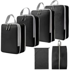 four pieces of black and white bags with zippers on each side, one is empty