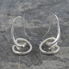 Wonderfully cool and contemporary, these handmade Curled Spiral Drop Sterling Silver Earrings feature a curl design fashioned into a spiral motif to create these beautiful statement earrings. Light, comfortable and just a little abstract! Small and perfectly formed, these unusual small drop earrings are ideal for everyday wear, the ideal size and weight to wear for prolonged periods, and with an intricate and pleasing design sure to attract approving comment. Made from: Sterling silver. Measurements: Earring Length: approx. 3.0 cm Gold Ear Climbers, Gold Ear Jacket, Small Drop Earrings, Silver Threader Earrings, Gold Chain Earrings, Threader Earrings Gold, Silver Chain Earrings, Chunky Statement Necklace, Silver Choker Necklace