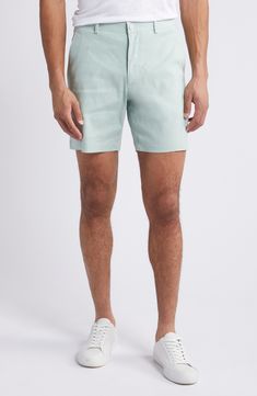 A relaxed fit is enhanced by the forgiving comfort of the lightweight linen blend in these hybrid shorts that are cool and breathable. 7" inseam; 20" leg opening; 10 1/2" front rise; 14" back rise (size 32) Zip fly with snap closure Partial elastic waist Front slant pockets 59% linen, 20% viscose, 20% polyester, 1% elastane Machine wash, tumble dry Imported Summer Cotton Bermuda Shorts, Cotton Bermuda Shorts With 5-inch Inseam For Summer, Green Bottoms With Welt Pockets For Summer, Summer Cotton Shorts With Straight Hem, Summer Bermuda Shorts With Built-in Shorts, 5-inch Inseam, Fitted Shorts With Straight Hem For Spring, Casual Bermuda Shorts With Welt Pockets For Summer, Relaxed Fit Bermuda Shorts With Welt Pockets For Summer, Summer Shorts With Short Inseam And Welt Pockets