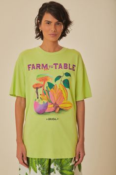 Embrace vibrant living with the Green Farm Rio To Table Organic Cotton T-Shirt, radiating with a round neckline and a relaxed silhouette. This refreshing green tee blossoms with bold, tropical illustrations, capturing the essence of Brazil's lush landscapes. Each stroke of color and organic cotton thread weaves a narrative of nature's bounty, promising a piece that's as unique as it is comfortable. A wearable canvas of artistry and sustainability, it's a joyful expression of your eco-conscious style. Composition 100% COTTONCare Instructions MACHINE WASH, GENTLE CYCLE, DO NOT BLEACH, DO NOT TUMBLE DRY, LINE DRYING, IRON AT MEDIUM HEAT, DRY CLEAN WITH ANY SOLVENT EXCEPT TRICHLOROETHYLENESize and Fit Inches XXS XS S M L XL Bust 40 2/4 42 2/4 44 2/4 46 2/4 49 2/4 52 2/4 Waist 40 3/4 42 3/4 45 Tropical Cotton Tops With Graphic Print, Spring Tropical Print Graphic Tee, Green Printed Tropical Tops, Green Tropical Printed Tops, Tropical Crew Neck Tops For Spring, Spring Graphic Tee With Tropical Print, Graphic Tee With Tropical Print For Spring, Tropical Relaxed Fit Top With Graphic Print, Tropical Style Relaxed Fit Top With Graphic Print