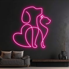 a neon pink dog sitting on top of a couch next to a wall mounted clock