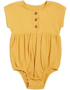 This yellow bubble romper is a cute and practical option for a day by the coast. Featuring an elasticated bubble short style bottom with snap buttons, the romper is great for quick changes while on the go. At the top, the romper is detailed with buttons down the front. Product Details: Cotton rib made with 55% Organically Grown Cotton, 40% Modal and 5% Elastane Elasticated cuffs and rounded neckline for all day comfort Easy glide zip down the front for easy changing Casual Short Sleeve Bubble Romper For Summer, Solid Color Short Sleeve Onesie For Summer, Summer Solid Color Short Sleeve Onesie, Casual Short Sleeve Cotton Bubble Romper, Cute Cotton Bubble Romper With Buttons, Casual Cotton Bubble Romper With Short Sleeves, Summer Short Sleeve Solid Color Onesie, Casual Spring Bodysuit With Button Closure, Summer Cotton Bubble Romper With Button Closure