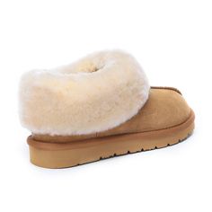 This cozy slipper with a central seam and a full collar offer an invitation to indulge in unparalleled comfort. Crafted with a lining and insole made from Sheepskin, it provides breathable warmth for chilly feet. Specification: Suede Upper Warm Sheepskin Wool Lining Soft Sheepskin Wool Insole Eva Sole Technologies: Water Resistance Upper Light Weight Outsole Shipt Shopper, Slippers Cozy, Jelly Sandals, Round Toe Heels, Eva Sole, Slipper Socks, Us Man, Water Shoes, Chestnut