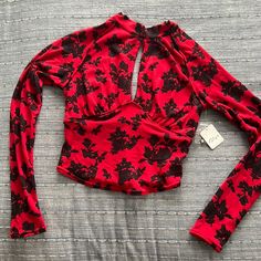 Free People Printed Long Sleeve Top Nwt Color: Black And Red Keyhole As Shown In Photos Button’s Located On Back Size: X-Small Could Fit Up To A Size 4 Red Stretch Edgy Top, Edgy Red Tops For Fall, Fitted Red Top In Edgy Style, Fitted Long Sleeve Tops For Date Night, Edgy Red Top For Night Out, Floral Print Long Sleeve Top For Night Out, Long Sleeve Floral Print Tops For Night Out, Red Stretch Top For Date Night, Stretch Red Top For Date Night