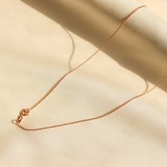 14K Rose Gold Rolo Chain Necklace, Rose Gold Rope Chain, Rose Gold Jewelry Features :  -Gold KT: 14K Solid Gold -Gold Color: Rose Gold -Chain Lengths: 14", 16", 18", 20", 22", 24" -Chain Width: 1 mm -Chain Style: Rolo Shipping:  -Ready to Ship in 1-2 Business Days -Packed in labeled gift box -The perfect birthday or holiday (Christmas, hanukah, valentines day...etc.) gift!  -FREE shipping on all U.S. orders  Contact us with any inquiries by Etsy convo : Want to find out more? Check out my shop h Classic Rose Gold Chain Necklace With Delicate Chain, Classic Rose Gold Clavicle Chain Necklace, Classic Rose Gold Delicate Chain Necklace, Classic Delicate Rose Gold Chain Necklace, Rose Gold Minimalist Cable Chain Necklace, Minimalist Rose Gold Cable Chain Necklace, Minimalist Rose Gold Necklace With Cable Chain, Delicate Rose Gold Cable Chain Necklace, Dainty Rose Gold Necklace With Rose Design