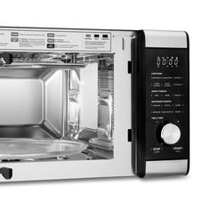 a microwave oven with the door open and it's inside