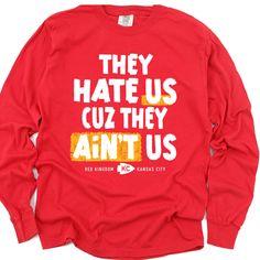 Our Kansas City Chiefs Shirt is perfect for fall football! Our Vintage Chiefs Shirts have a funny design that everyone in Chiefs Kingdom will love:  **They Hate Us, Cause They Ain't Us** KC Chiefs fans know we are in our villain era! Other NFL teams hate on the Chiefs because of #15 Patrick Mahomes and #87 Travis Kelce. We created this Kansas City Travis Kelce tee with our favorite quarterback and tightend in mind.Our  **They Hate Us, Cause They Ain't Us** shirts come in Ivory and Red. **Comfort Colors Unisex Garment-dyed Long Sleeve T-Shirt** Made with 100% ring-spun cotton, the Comfort Colors 6014 Unisex Garment-dyed  Long Sleeve T-Shirts come packed with softness and style. Each tee features garment-dyed fabric and comes with a relaxed fit for total comfort in any casual setting.  .: 10 Chiefs Shirt, Kansas City Chiefs Shirts, Villain Era, Chiefs Kingdom, Chiefs Shirts, Fall Football, Patrick Mahomes, Kc Chiefs, Travis Kelce