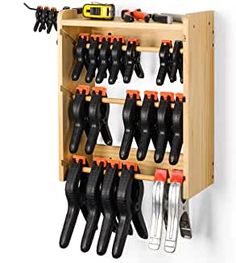 a rack with many different tools hanging on it