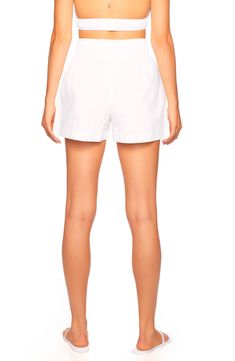 These summery poplin shorts are crafted with crisp pleats and smocking at the back waist. 3" inseam; 10 1/2" front rise; 13 1/2" back rise Hidden side-zip closure Back elastic waist Side-seam pockets Unlined 100% cotton Machine wash, tumble dry Made in the USA of imported fabric Summer Bottoms With Pleated Waist For Daywear, Cotton Bottoms With Pleated Waist In Short Length, Cotton Bottoms With Pleated Waist And Short Length, Summer Bottoms With Pleated Waist And Short Length, Casual Pleated Waist Short Bottoms, Stretch Summer Shorts For Daywear, Casual Pleated Waist Shorts, Summer Stretch Shorts For Daywear, Casual Short Bottoms With Pleated Waist