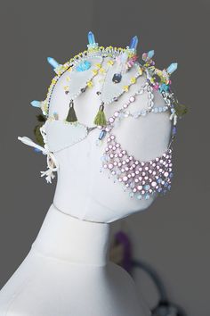 Masquerade face chain headpiece mask for carnival, festivals or burning man. Harajuku fashion mask. Headpiece made by bead embroidery technique. Crystal crown inspired by Japanese wedding costume. The trend of harajuku fashion. Size adjustable on back. Oversized headpiece. Headpiece made of: Vegan leather of vanilla color, White opal point beads, Round opal stone beads, Round transparent quartz stone beads, Glass crystal beads, Natural corals, Moss cotton tassels, Colored flakes, Seed beads, Veg Whimsical Headpieces For Mardi Gras Carnival, Fantasy Adjustable Headpieces For Carnival, Adjustable Fantasy Headpieces For Carnival, Handmade Adjustable Headpiece For Masquerade, Adjustable Festival Headpiece With Rhinestones, Adjustable Rhinestone Headpiece For Festival, Adjustable Rhinestone Festival Headpiece, Bohemian Headpiece For Mardi Gras Party, Fantasy Style Masquerade Mask For Carnival Festival