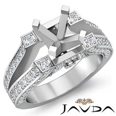 a diamond engagement ring set with diamonds on the band and an oval shaped center stone