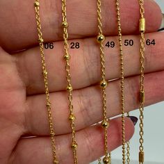 -------------------------Product Details----------------------------- Finished Gold Bead Chain Necklaces For Layering, Ready To Wear. Material: 22K Gold Over .925 Sterling Silver Choose Your Length, 16", 18", 20", 22", 24", 26", 28", 30", 36" Made In Italy --------------------------------------------------------------------------- Chain Style: 06-Beaded Satellite Cable Chain 28-2.5mm Ball Satellite Chain 49-3mm Ball Satellite Chain 50-1.2mm Ball Chain 64-4mm Textured Bar Satellite Chain --------------------------------------------------------------------------- Thanks for visiting, for more jewelry please visit shop: https://www.etsy.com/shop/BeadUnion Dainty Necklaces With Cable Chain And Round Beads, Ball Chain Necklace With Round Beads For Gifts, Gift Ball Chain Beaded Necklace, Round Beaded Ball Chain Necklace For Gift, Round Beaded Necklace With Ball Chain For Gift, Gold Necklace With Round Beads And Cable Chain, Gold Necklace With Cable Chain And Round Beads, Ball Chain Link Necklace For Gifts, Gift Ball Chain Link Necklace