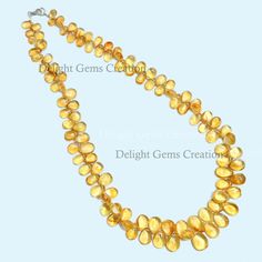 Product Details : Item Code : DGC945Gemstone Name : CitrineChain Style : Beaded Beads Shape : Smooth DropsBeads Size : 5x7-10x14 mm ApproxLength : 18" Inch ApproxWeight : 260 Cts. ApproxCustomization : **Available**Please Feel Free To Contact If You Have Any Query. Halloween Beaded Jewelry, Beaded Beads, Tigers Eye Necklace, Citrine Beads, Citrine Necklace, Yellow Citrine, Natural Citrine, Citrine Gemstone, Drop Beads