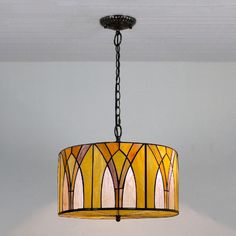 a chandelier hanging from the ceiling in a room