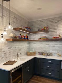 the kitchen is clean and ready to be used for cooking or baking, while also being used as a wine cellar