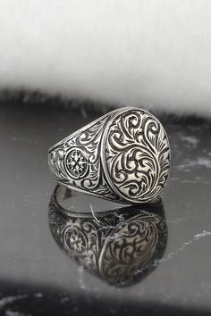 Attention : This ring is completely handmade by silver masters! Monogram Floral Design 925k Silver Engraved Ring  This incredible silver men ring is engraved from 100% handmade. This shiny Engraved ring, has a modern and vintage vibe for daily using. You can use it for daily or special days. The engraving details of pure 925 Sterling Silver Handmade Ring are very detailed and eye-catching. You can prefer this vintage style silver ring like gift for your friends or family. It's a perfect gift for birthday, valentine's day, International Women's Day, anniversary, statement(cocktail) or christmas. Item Details: * Gender : Man/Woman * Material : 925K Sterling Silver * Total Weight: 8gr! *Ready to Ship in 1-5 Business Days! ( Because it is handmade  ) *Free Express Shipping Process: 2-5 busines Luxury Silver Intaglio Men's Ring, Vintage Antique Silver Signet Ring Gift, Artisan Engraved Rings For Promise, Artisan Etched Ring Jewelry, Etched Sterling Silver Open Ring, Etched Sterling Silver Open Ring Jewelry, Artisan Engraved Rings For Formal Occasions, Vintage Sterling Silver Engraved Signet Ring, Antique Engraved Signet Ring In Silver