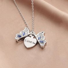 Vintage Open Butterfly Necklace Love Heart Animal Necklace Retro Boho Heart Shaped Album Box Sapphire Pendant Necklace Lettering English I Love You Love Heart Necklace Female Valentine's Day Anniversary Gift Jewelry Blue Heart Charm Jewelry As A Gift, Blue Heart Charm Jewelry As Gift, Blue Heart Charm Jewelry For Gift, Blue Heart Charm Jewelry Gift, Blue Jewelry With Heart Charm For Gifting, Blue Heart Pendant Jewelry For Mother's Day, Silver Heart Locket Necklace Gift For Her, Blue Heart-shaped Jewelry For Mother's Day, Personalized Blue Necklaces For Valentine's Day