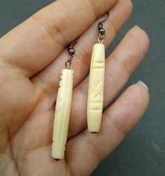 Carved bovine bone formed into a bead. It has a 925 plated silver french hook. If you would like to continue shopping for decorative bone items, wood paintings, and other rustic home décor, you may continue shopping by clicking this link, https://etsy.com/shop/CreativeWorkByAnnie Bohemian Bone-colored Nickel-free Earrings, Bohemian Bone-colored Pierced Earrings, Traditional Bone-colored Jewelry Gift, Traditional Bone-colored Jewelry As A Gift, Bohemian Bone-colored Earrings, Unique Bone-colored Nickel-free Earrings, Unique Carved Bone Jewelry, Unique Bone-colored Carved Jewelry, Wood Paintings