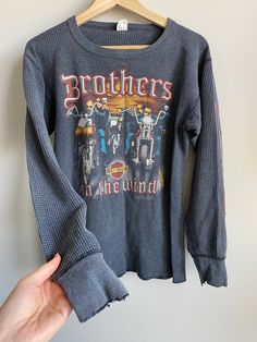 RARE Super trendy vintage Harley Davidson long sleeve waffle weave shirt from the 1980s Band of Brothers print on front H&M Dover Ohio on back Size XL vintage sizing fits more like a modern day large super hard to find style Very vintage Harley shirt Authentic wear super cool ✨ Overall great vintage condition from this era but wear on sleeve and neckline as shown and one or two small holes Vintage Long Sleeve Shirt, Harley Shirt, Find Style, Harley Shirts, Band Of Brothers, Vintage Long Sleeve, Soft Classic, Vintage Harley Davidson, Vintage Harley