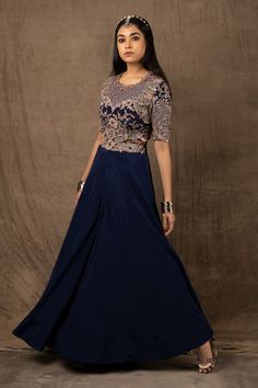 Blue lehenga with zardozi embroidery on the waistband. Comes with embroidered blouse.
Component: 2
Pattern: Embroidery
Type Of Work: Zardozi, Coin, Mirror and Sequin
Neckline: Round
Sleeve Type: Half
Fabric: Organza and Crepe
Color: Blue
Other Details: 
Cutwork detail on the hems
Occasion: Sangeet - Aza Fashions Anarkali Style Embellished Lehenga For Formal Occasions, Formal Anarkali Lehenga Embellished, Formal Embellished Anarkali Lehenga, Formal Navratri Choli With Cutdana Details, Formal Navratri Choli With Cutdana, Formal Choli With Zari Work For Navratri, Formal Navratri Lehenga With Zari Work, Formal Lehenga With Zari Work For Navratri, Embroidered Floor-length Lehenga For Formal Occasions