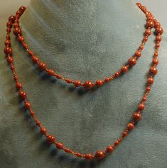 "Hand knotted quality Czech glass beads, the color of my dogs eyes (burnt sienna), Swarovski crystal and solid brass beads are featured in this long necklace. All metal is solid brass. Necklace finished length is 36.50\" with a 2\" extender and can be doubled.  Matching earrings are available. Stamped on a sterling silver tag by artist, ready to ship and would make a great gift.  JXC-Ollieseyes" Dogs Eyes, Burnt Sienna, Long Beaded Necklace, Wire Wrapped Necklace, Lemon Quartz, Czech Glass Beads, Matching Earrings, Czech Glass, Long Necklace