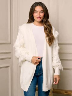 Get cozy and stylish with our Long Sleeve Open-Front Boho Fringe Cardigan! Perfect for any occasion with its unique boho fringe design and comfortable long sleeves. Stay trendy and warm in this must-have addition to your wardrobe. (Bonus points for pairing with your fave boots and a hot cocoa in hand!) * Color: White * 52% Acrylic 28% Polyamide 20% Spandex * Hand Wash * Model is wearing size S | Length: 29" Bust: 42" Waist: 21" Fall Outerwear With Tassels, Cozy Fringe Outerwear For Fall, Cozy Long Sleeve Outerwear With Fringe, Winter Outerwear With Tassels And Long Sleeves, Winter Long Sleeve Outerwear With Tassels, Fringe Long Sleeve Outerwear For Winter, Trendy Winter Outerwear With Fringe, Cozy Fringe Cardigan For Fall, Trendy Fringe Sweater For Fall