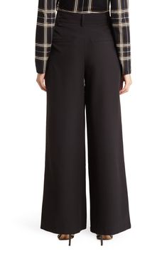 Carefully tucked pleats accent these polished workday pants punctuated with elongating front seams and wide legs. 13" rise, 32" inseam (size 2) High waist Zip fly with hook-and-bar closure 96% polyester, 4% spandex Machine wash, tumble dry Imported Model stats: 5'10" height, 32" bust, 25" waist, 36" hip. Model is wearing size 2 Black Wide-leg Pants With Pressed Crease, Black Wide Leg Pants With Pressed Crease, Tailored Wide Leg Career Pants, Elegant Wide Leg Career Pants, Elegant Wide-leg Career Pants, Chic Fall Career Bottoms, Chic Wide Leg Dress Pants For Career, Wide Leg Pants With Pressed Crease For Office, Chic Wide Leg Career Pants