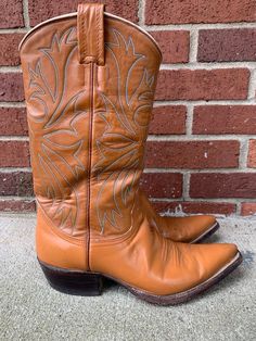 Vintage Men's Nocona Butterscotch Pointed Toe Cowboy Boots  Size 7D 11" from heel to toe 4" across sole 12" tall Western Closed Toe Boots For Western-themed Events, Western Style Closed Toe Boots For Western-themed Events, Western Snip Toe Boots With Rubber Sole, Goodyear Welted Pointed Toe Fitted Boots, Fitted Snip Toe Boots With Rubber Sole, Fitted Closed Toe Boots For Western-themed Events, Fitted Vintage Brown Western Boots, Vintage Brown Snip Toe Boots With Leather Sole, Moc Toe Boots With Leather Sole For Western-themed Events