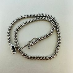 18K White Gold Tennis 6.5" Bracelet with 81 Diamonds (1.0ct) (includes appraisal, Value: $3,600) Designer = Jewelry Material = 18K Gold Gemstone = Diamond Condition = New Location: Wilmette Item Number: 21800-3 Item ID: 299848 Category: Bracelet Formal Diamond White Jewelry With Box Chain, Modern Diamond Tennis Bracelet With 17 Jewels, Classic Diamond Bracelet With Box Chain, Elegant White Gold Tennis Bracelet With Box Chain, Elegant Round Tennis Bracelet With Box Chain, Elegant Box Chain Tennis Bracelet, Luxury White Gold Diamond Bracelet With Box Chain, Formal Round Tennis Necklace With Box Chain, Elegant Diamond Bracelet With Box Chain For Formal Events