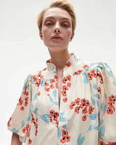 Hook and eye closure at neckline Length from Highest Point to Hem: 25" Dramatic, elbow-length puff sleeves Trapunto stitched neckline Silk Charmeuse Night Tops, Blouse Price, Hook And Eye, Puff Sleeve Blouse, Silk Charmeuse, Cropped Denim, Lantern Sleeves, Silk Top, Denim Top