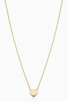 As sweet to look at as it is to wear, our Sweet Heart Pendant Necklace is the layering staple you need. Adjustable from 15 to 17 inches, wear it short as a choker or long as a necklace. However you style it, you're sure to be looking sweet. Metal: 14k Solid Yellow Gold Chain Dimensions: 0.9mm Thick, 17 Inches Long, Adjustable to 16 or 15 Inches Pendant Dimensions: 5.5mm Tall, 6.2mm Wide Weight: 1.5 Grams Country of Origin: Istanbul, Turkey Classic Necklace With Delicate Chain And Heart Pendant, Everyday Yellow Gold Solitaire Necklace With Cable Chain, Classic Gold Heart Pendant Solitaire Necklace, Classic Heart Necklace With Adjustable Chain, Classic Heart Necklace With Delicate Chain, Classic Heart-shaped Necklace With Cable Chain, Classic Heart Pendant Necklace With Cable Chain, Gold Heart Solitaire Necklace Gift, Gold Heart Shaped Solitaire Necklace Gift