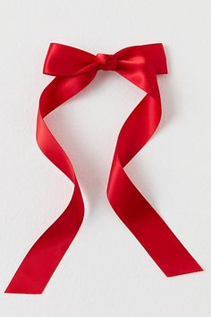 a red ribbon on a white background