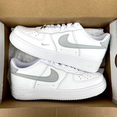 Custom sneakers hand painted authentic white Nike Air Force 1 light gray swooshes and back of the sneakers small nike logo on the left sneaker All sneakers are made on order, please allow the indicated time for your item to be shipped. If you have any questions about the process time or do you need the sneakers quickly? Just send us a message!   * Be aware of your sneaker size, please in doubt go to the store first * Sneakers color may vary slightly due to photographic lighting and sources of yo Sporty White Nike Air Force 1 With Rubber Sole, White Nike Air Force 1 With Rubber Sole, Nike Air Force 1 White With Gum Sole, Gray Low-top Nike Air Force 1 For Sports, Gray Low-top Custom Sneakers With Gum Sole, Custom Low-top Gray Sneakers With Gum Sole, White Nike Air Force 1 With Air Max Cushioning, Gray High-top Nike Air Force 1 For Sports, Gray High-top Nike Air Force 1