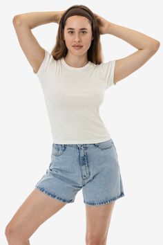 This versatile t-shirt is made of our 1x1 combed cotton baby rib and has been garment dyed to match our bestselling styles. This top has a feminine cut with cap sleeves and a crew neckline finished with tasteful binding. Semi-fitted with a flattering mid-length cut. This 100% cotton has been garment dyed and is shrink-free! Made in the USA with US-grown cotton by workers earning fair wages. This item is a garment dye product. Garment dye items can be distinguished by “GD” at the end of their sty Denim Short Jumpsuit, Jumpsuit Jacket, Denim Tote, T Shirt For Women, Crew Neck Shirt, Cotton Baby, Festival Wear, Cotton Style, Cap Sleeve