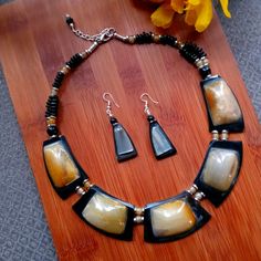 2pc Beautiful Women's African Bronze Quartz Necklace And Earrings Set. Brown Jewelry With Black Beads For Gift, Gift Brown Jewelry With Black Beads, Handmade Brown Resin Jewelry, Pebble Jewelry, Necklace And Earrings Set, Brand Jewelry, Quartz Necklace, Necklace And Earrings, No Brand