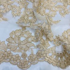 Handmade, high quality Double Sided Floral Lace Trimming Corded Embroidered on 100% Polyester Net Mesh. Beautiful on wedding dresses, evening gowns, dance costumes, and more. Content: 100% Polyester / Minimum Order: 1 Yard / Size: Approximately 17.5" Wide / Ships within 24 business hours. Colors: This product comes in 4 different colors. Gold Floral Embroidered Fabric For Ceremony, Elegant Festive Lace With Floral Embroidery, Elegant Embroidered Lace Fabric For Celebration, Festive Elegant Lace With Floral Embroidery, Elegant Floral Embroidered Lace For Festive Occasions, Elegant Gold Embroidered Fabric For Ceremonies, Gold Embroidered Dress For Ceremony, Elegant Floral Embroidery Organza Lace, Elegant Organza Lace With Floral Embroidery