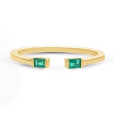 Emerald Baguette Open Ring Elevate your everyday style with the 'Vida Ring', a timeless classic that exudes understated sophistication. Crafted for comfort and versatility, this open ring boasts the highest quality 3x2mm baguette shaped emeralds that add a touch of glamour with every presentation. SKU BS32187R EMERALD SIZE 3x2mm COLORSTONE SHAPE Baguette Ethically sourced emeralds directly from our renowned Belmont mine in Brazil. Classic Baguette Rings For Everyday, Modern Yellow Gold Emerald Open Ring, Modern Yellow Gold Open Emerald Ring, Minimalist 14k Gold Baguette Ring, Modern 14k Gold Emerald Cut Stackable Rings, Modern 14k Gold Open Emerald Ring, Modern Stackable Emerald Cut 14k Gold Rings, Modern Yellow Gold Baguette Ring, Modern Baguette Yellow Gold Rings